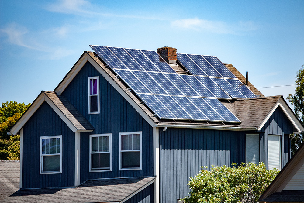 Blue home with solar panels