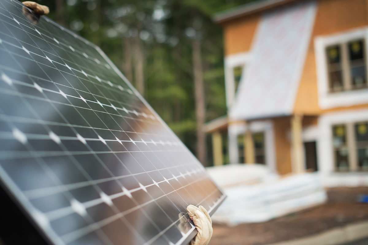 Solar panel close up in front of a residential home