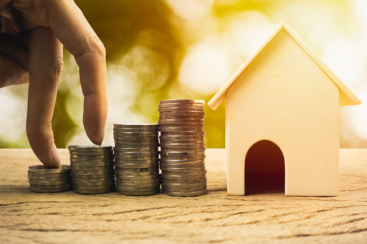 Homeownership incentive graphic of fingers crawling up coins