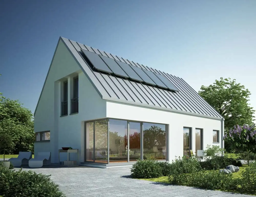 Solar panels on a metal roof, of a modern home