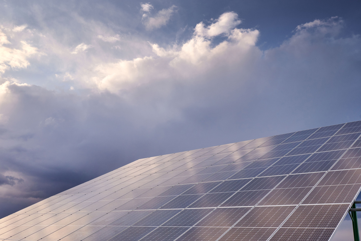 Solar panel close up against a cloudy sky