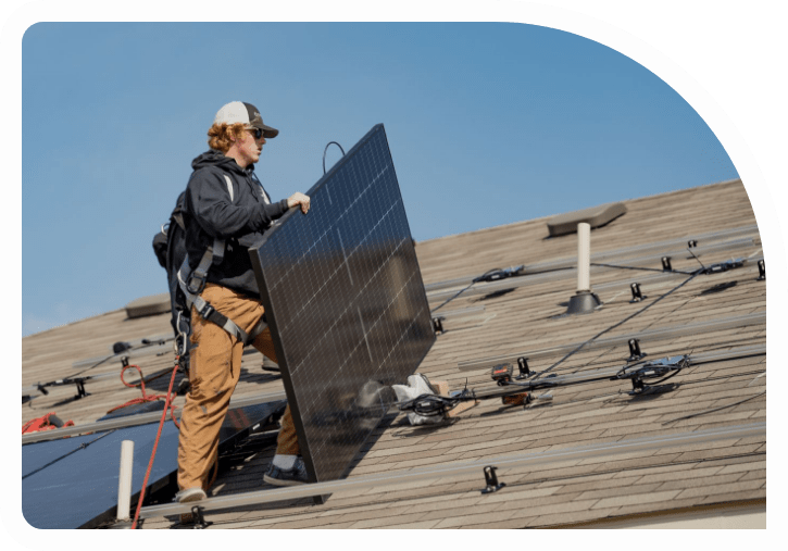 LGCY Power Installer, Installing modern elegant black solar panels on the roof